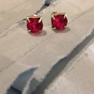 Cute redish pink earrings.